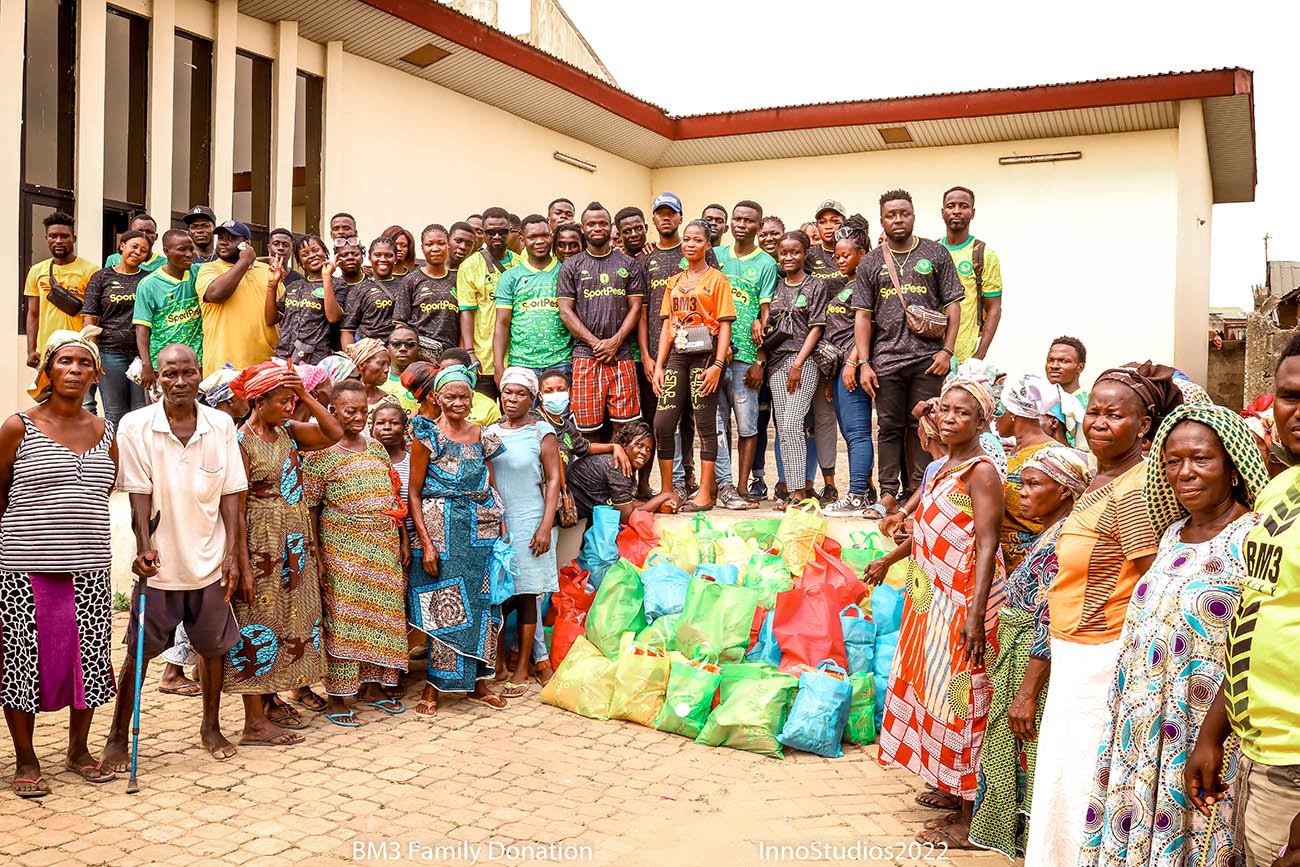 A group picture of some of our dedicated volunteers and some elders in the community of Effia